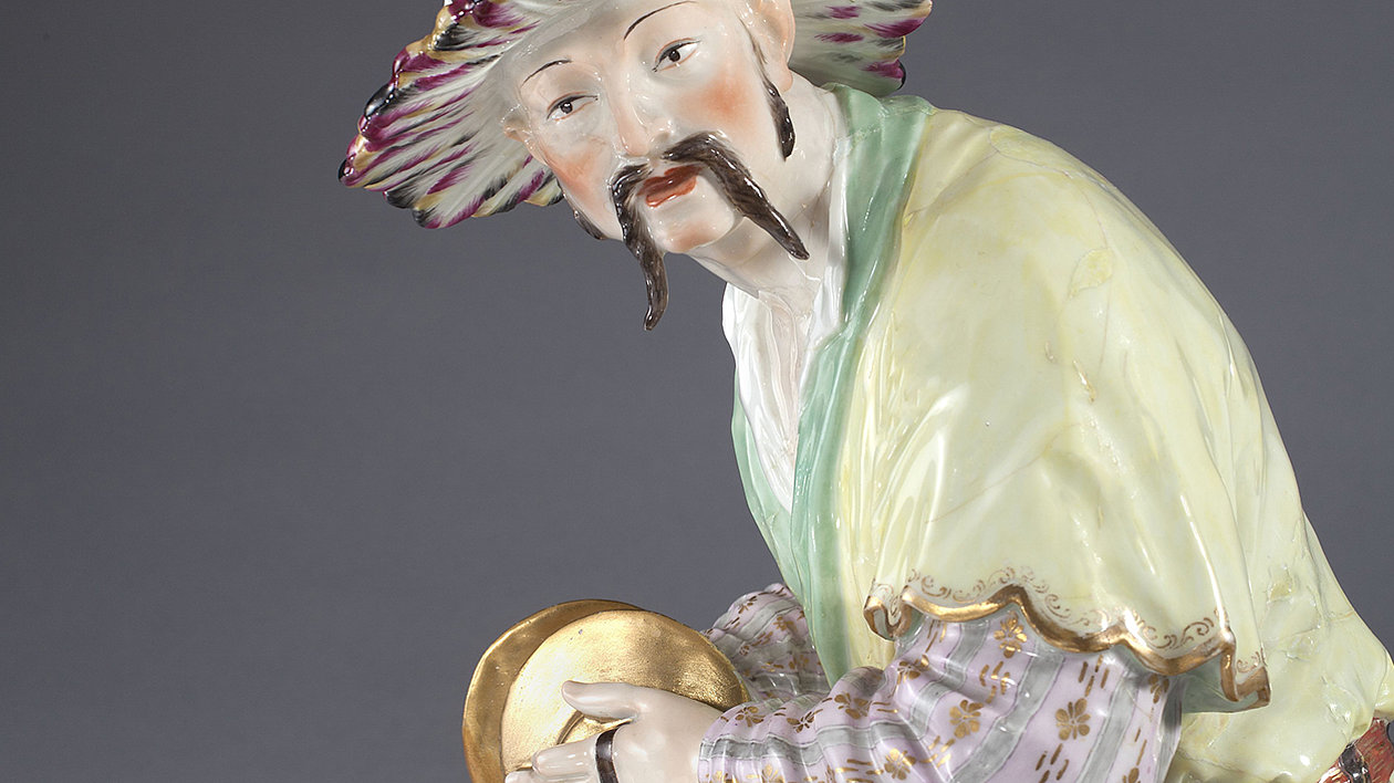 Porzellanfigur Chinese mit Tschinellen (Detail)