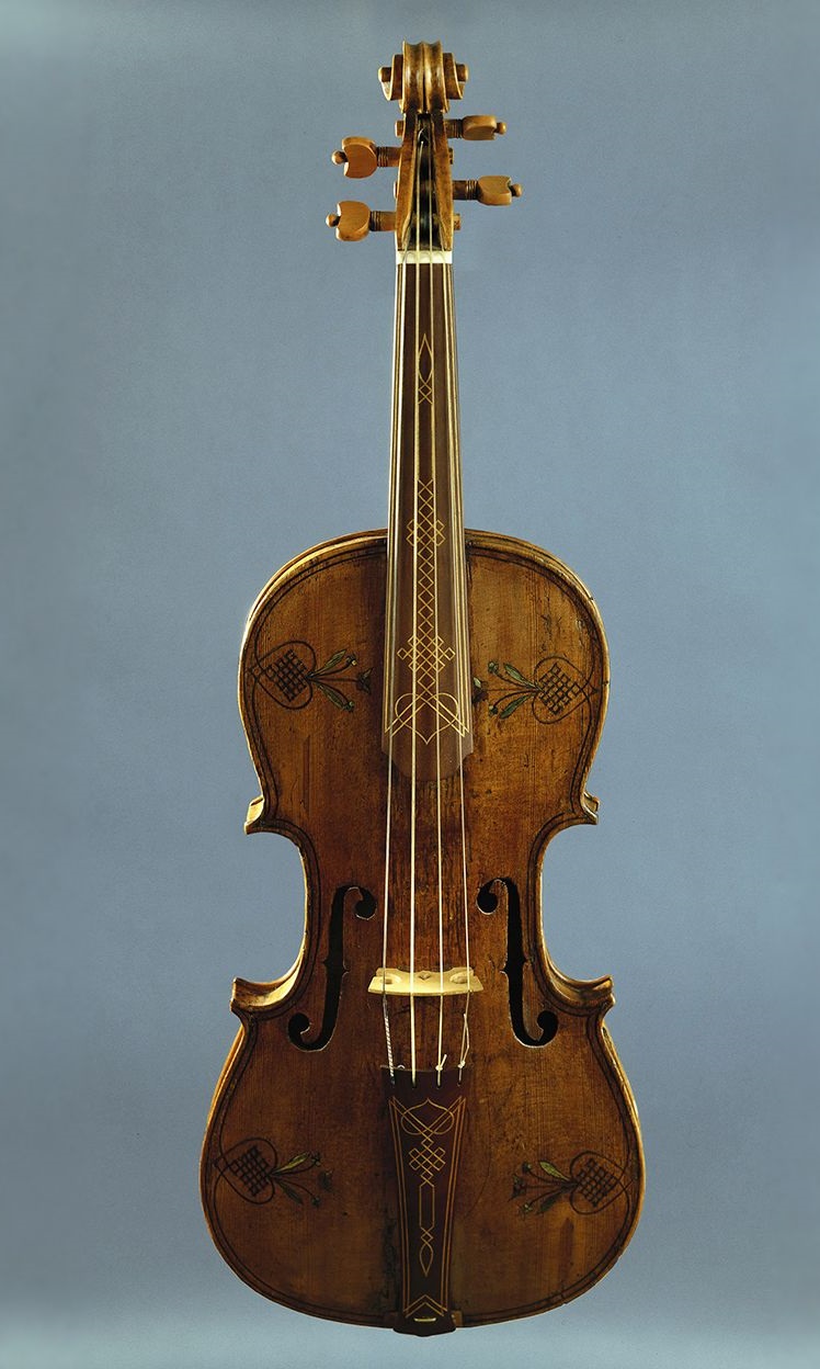 Violin with colourfull decorations on the top